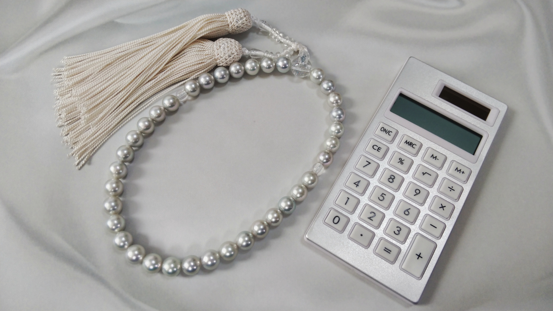 電卓と数珠